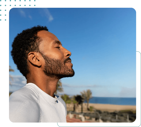 Man enjoying a peaceful beach view.