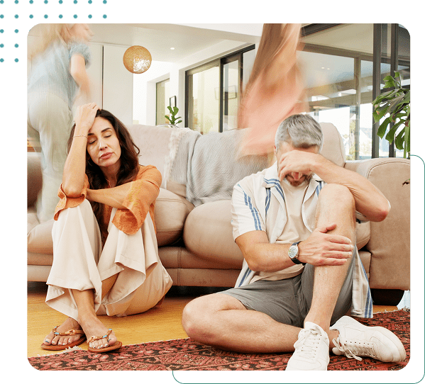 Frustrated couple with kids running around.