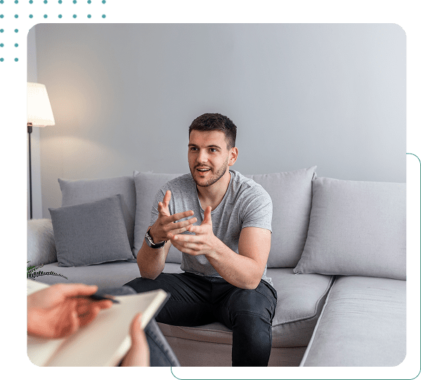 Man talking during a therapy session.