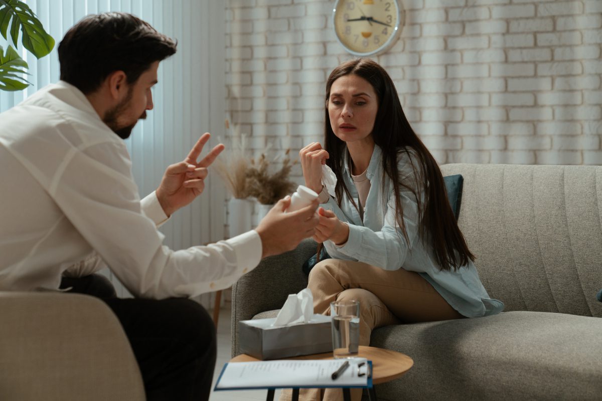 Therapist and woman in a counseling session.